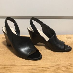 Black leather sling back Franco Sarto sandals.